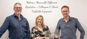 Photograph of durhamlane team members holding award