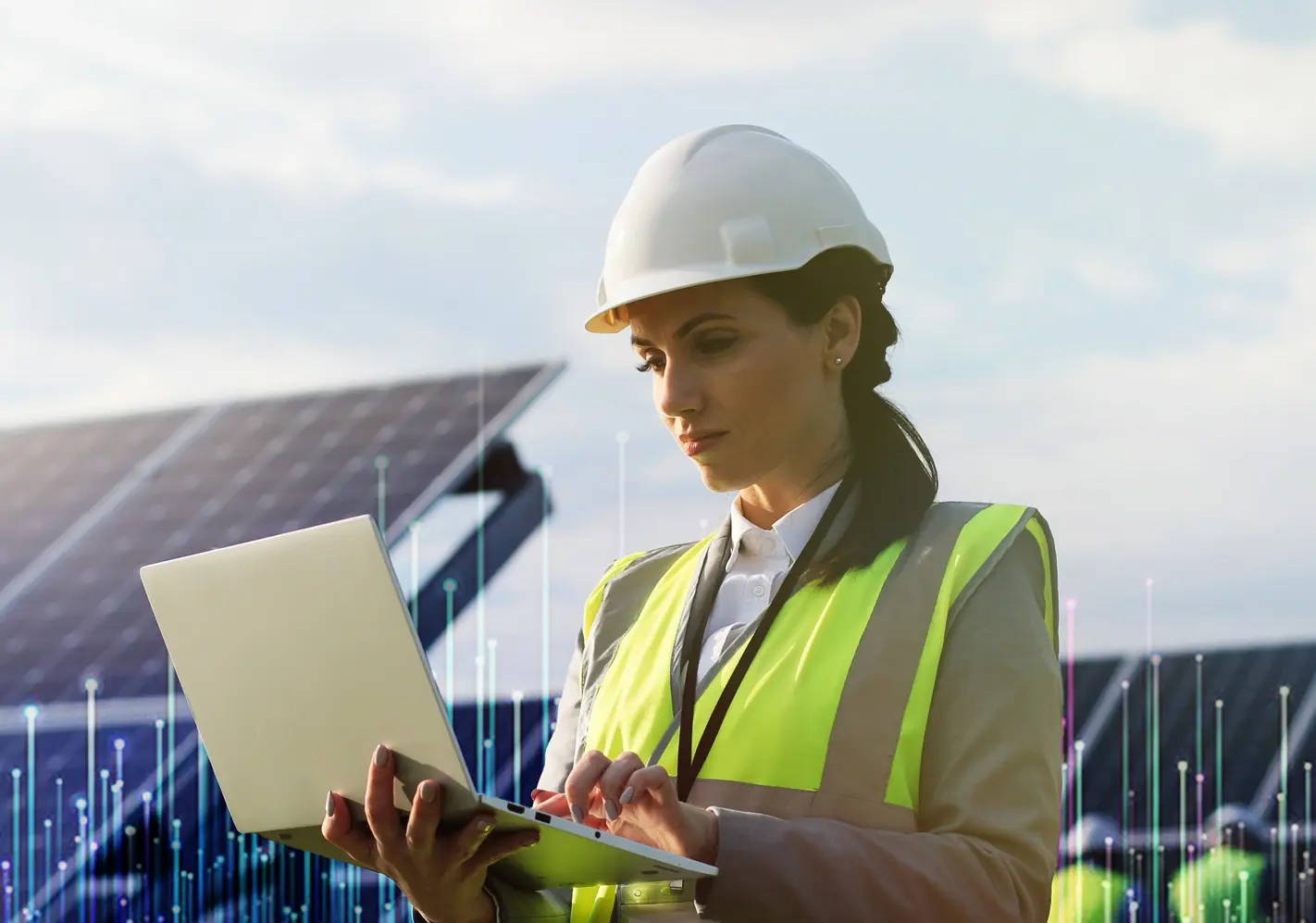 Headshot of Centrica female in high vis with laptop