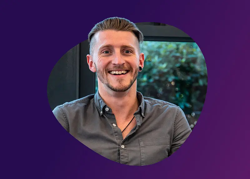 Photograph of durhamlane Head of Sales James Middleton with purple background
