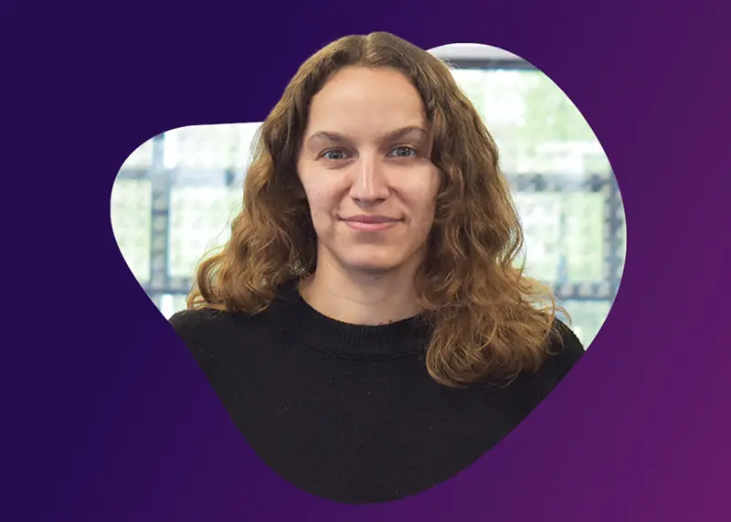 Photograph of durhamlane sales development rep on purple background