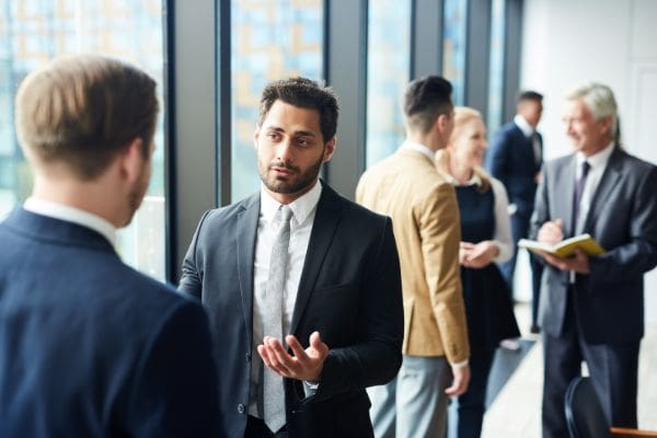 Office workers talking